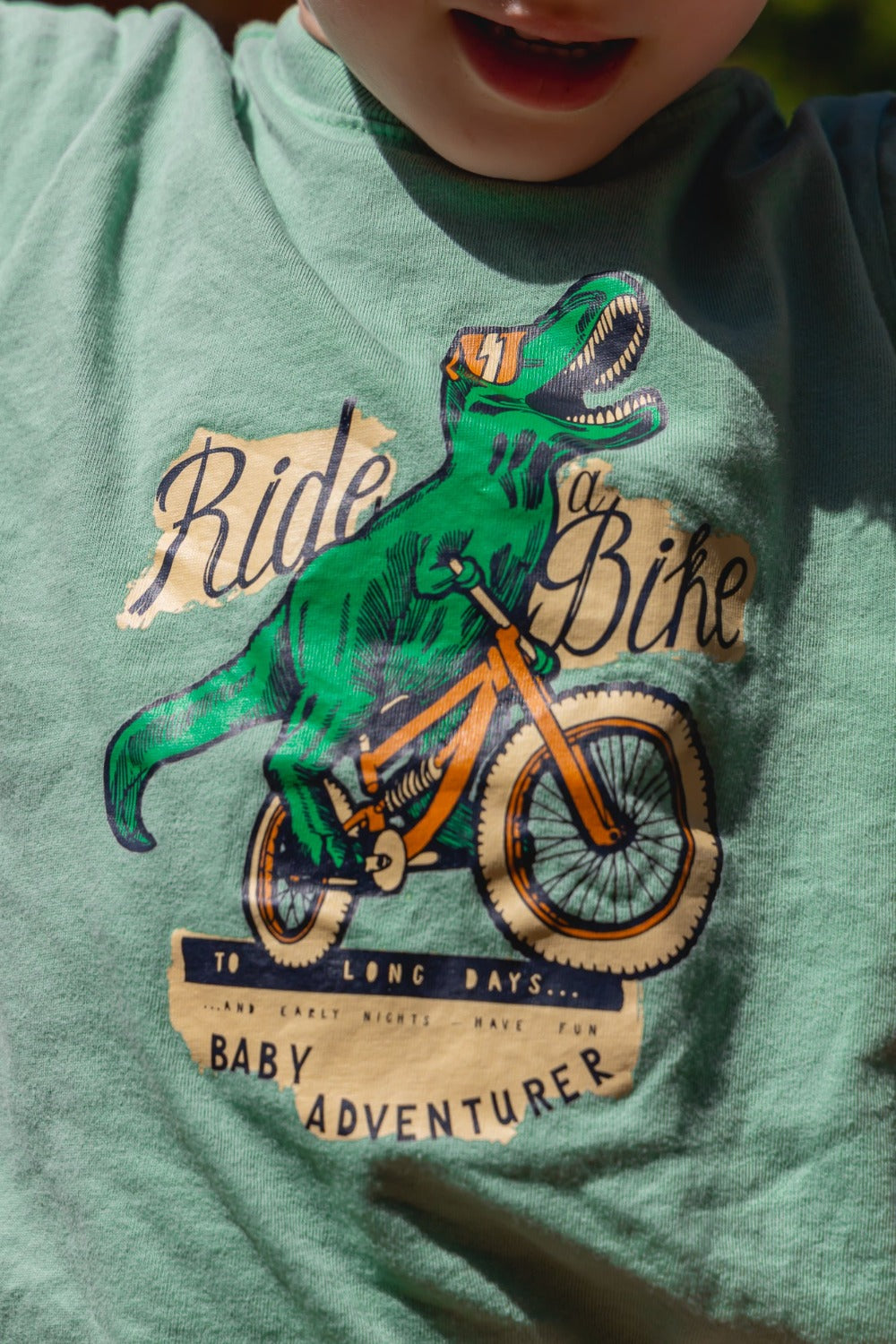 Dino Bike - Baby Adventurer™ - Dinosaur Biking Toddler Tee